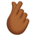 🫰🏾 hand with index finger and thumb crossed: medium-dark skin tone display on Apple